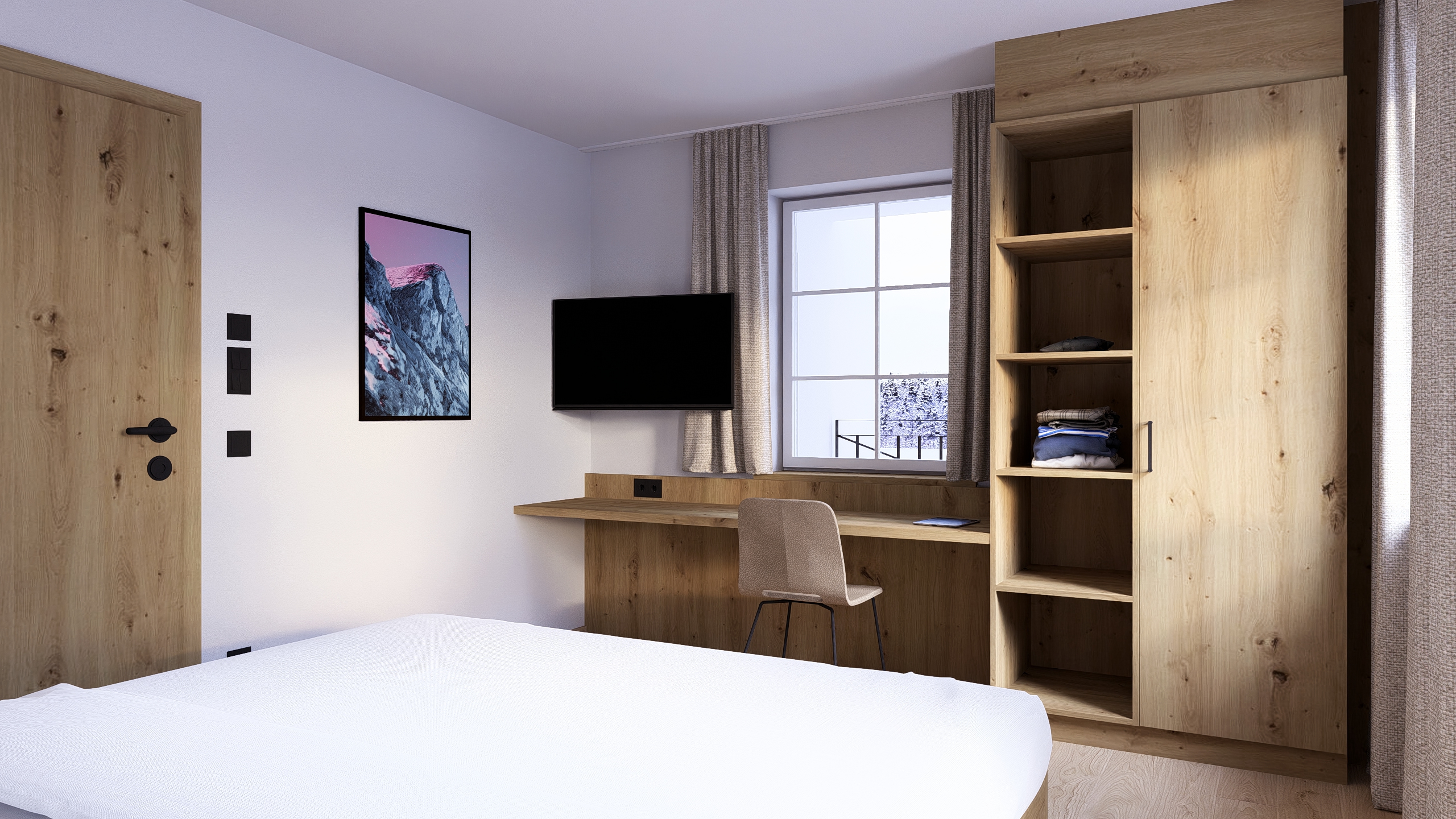 Schlafzimmer mit Doppelbett, TV und Schreibtisch